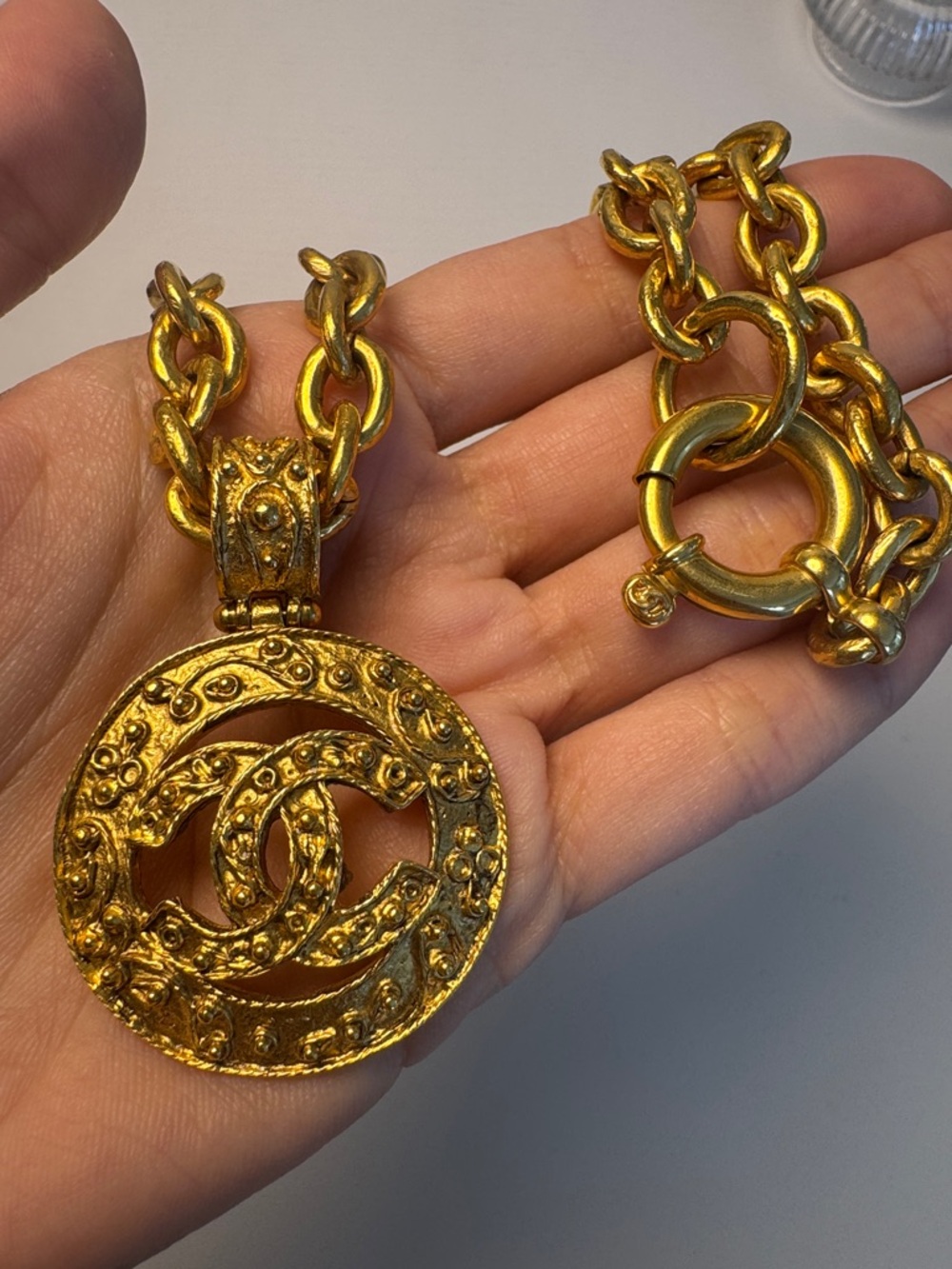 CHANEL Gold-Tone Embossed CC Medallion Necklace